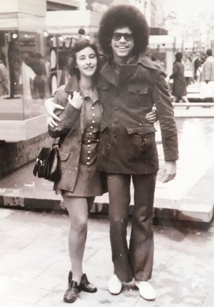 Couple enjoying a day out in 1973, capturing a moment of 1970s fashion and style in the world.