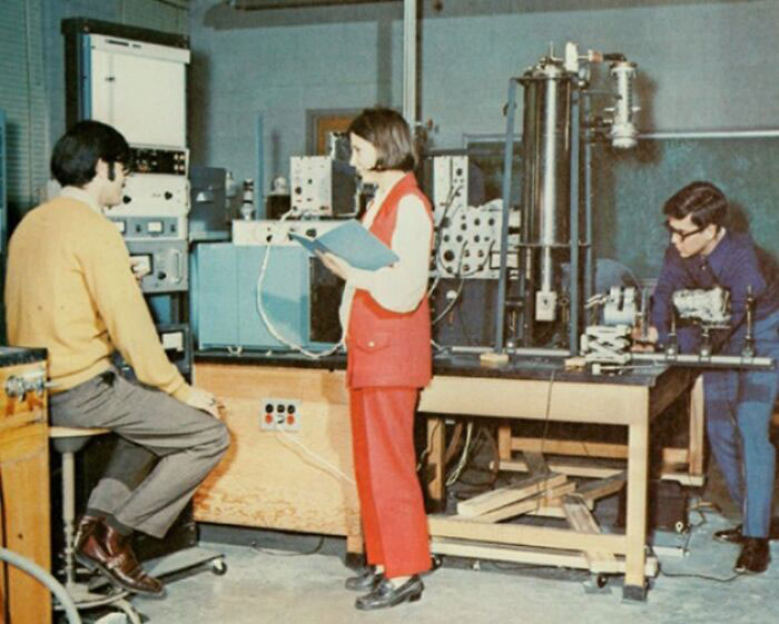 '70s high school science class with students and vintage lab equipment.