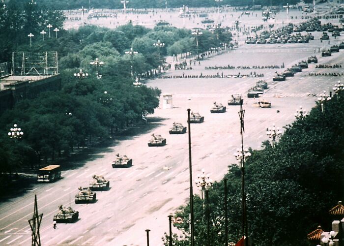 Tanks lining a wide avenue, providing a new perspective on a famous historical event.