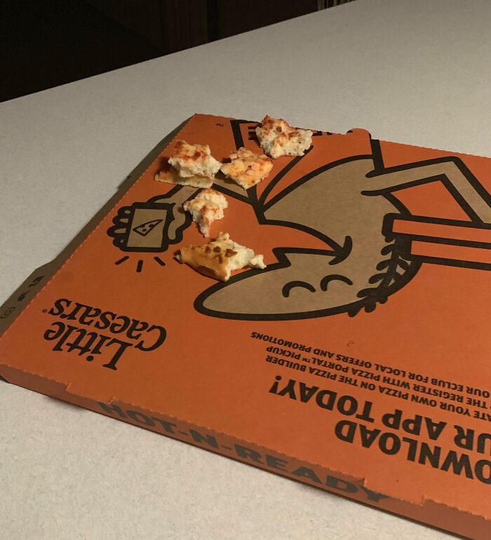 Pizza box with only crust pieces left, suggesting infuriating family members took all the good slices.