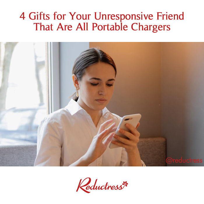 Woman sitting indoors, focused on her phone, with a fake article headline from Reductress online magazine.