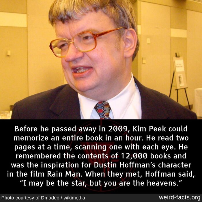 Man with glasses at an event, inspiring character in Rain Man. Weird facts about his unique reading abilities.