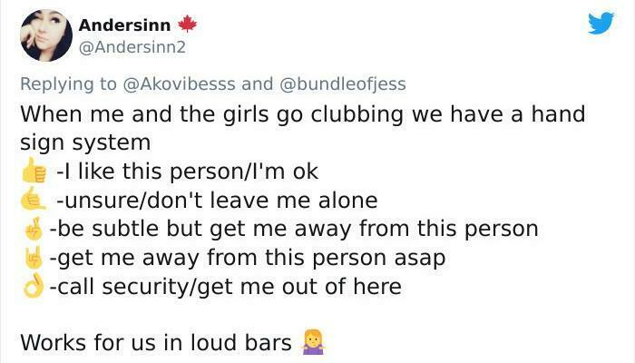 Tweet explaining a hand sign system used by a group of girls when clubbing to communicate in loud bars with unique visuals.
