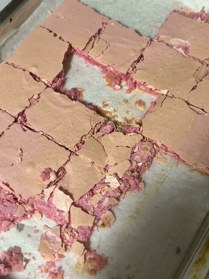 C*****d pink dessert squares with uneven pieces arranged messily on a tray, highlighting lazy-infuriating-people.