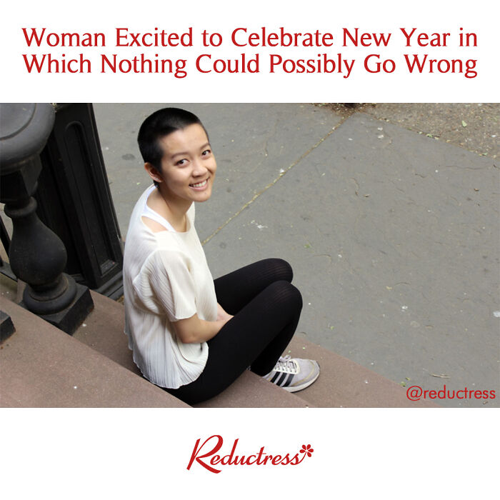 Young woman sitting on outdoor steps smiling, representing funny fake article headlines from Reductress magazine.