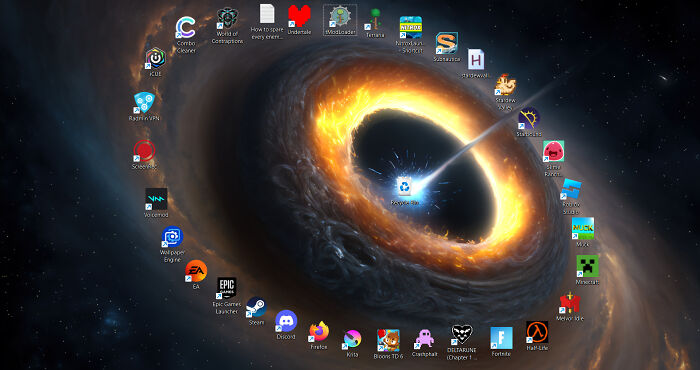 Desktop with space theme wallpaper cluttered with uninteresting assorted app icons.