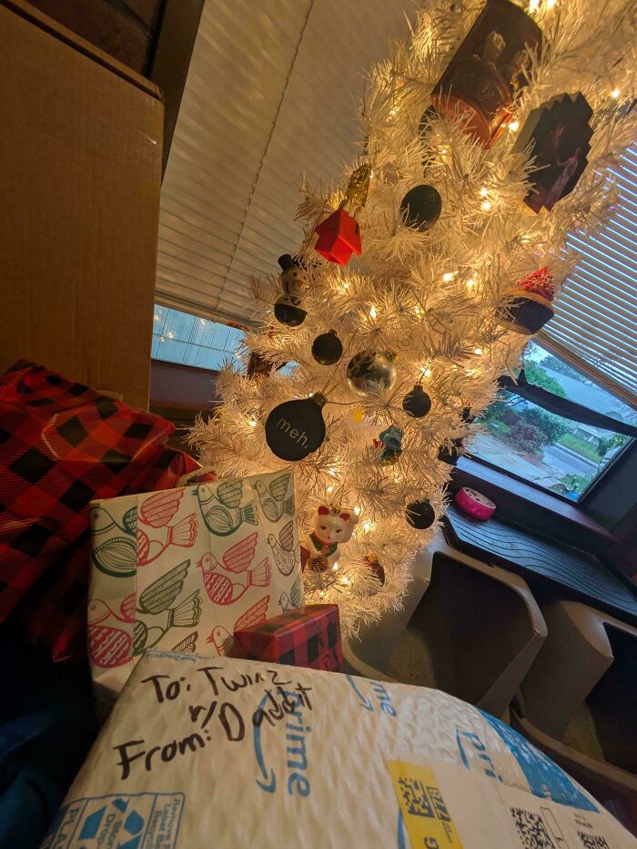 Wholesome dad moments: a festive Christmas tree with gifts labeled from dad, showcasing love and joy.