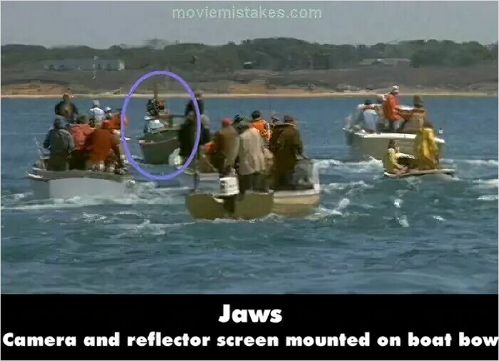 Scene from Jaws showing movie mistakes with a camera and reflector screen mounted on the boat bow in the water.