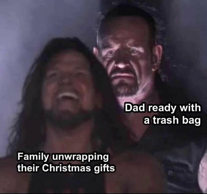 Two men in a humorous scene, one smiling labeled "Family unwrapping gifts," the other serious, labeled "Dad with a trash bag." Memes for men.