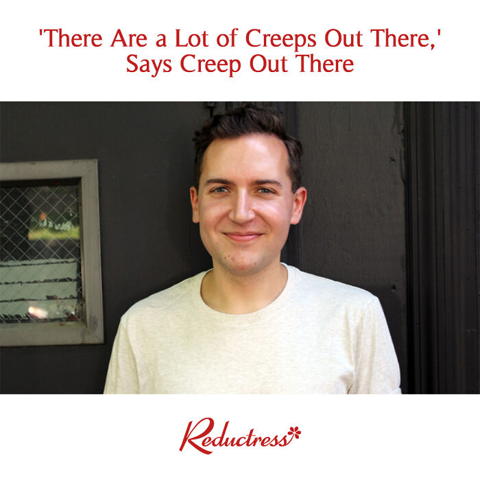 Young man smiling casually in front of a dark wall, representing funny fake article headlines from Reductress magazine.