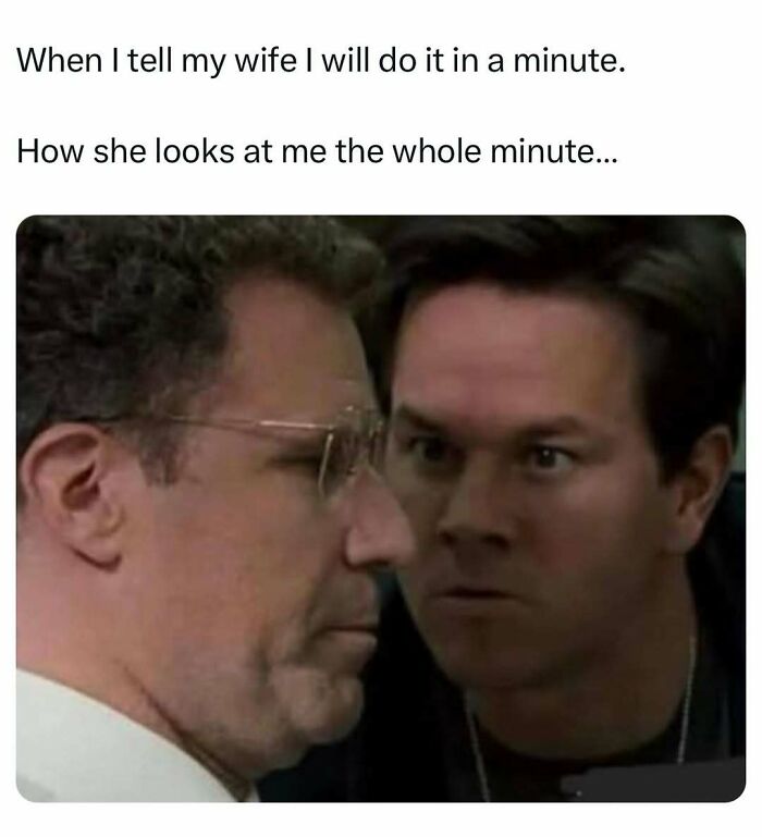 Two men face each other intensely, illustrating dad humor about procrastination.