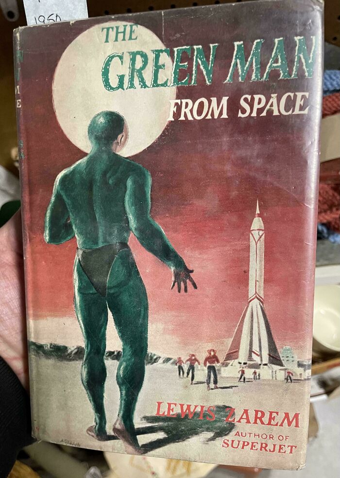 Terrible book cover featuring a green space alien by a rocket, titled "The Green Man from Space" by Lewis Zarem.