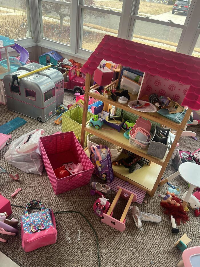 Messy playroom filled with toys, showcasing the rewarding chaos of being a dad.