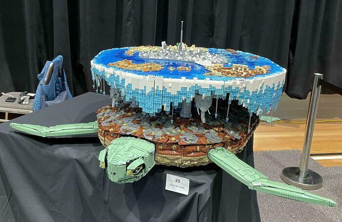 Cool LEGO builds: A giant LEGO turtle carrying a detailed floating island on its back.