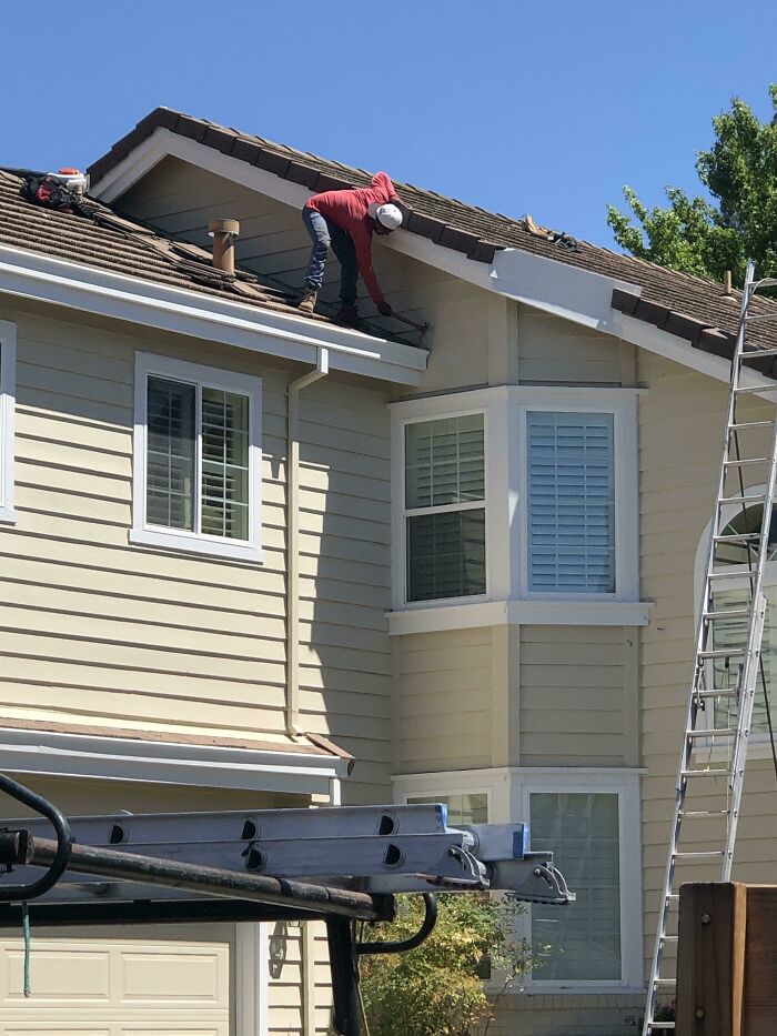 This Guy Doing Tile Repair On My Neighbor's House. No Harness, No Problem!