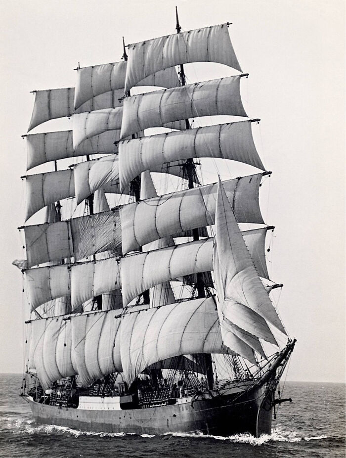 Historical sailing ship on the open sea, showcasing impressive sails and classic maritime design.