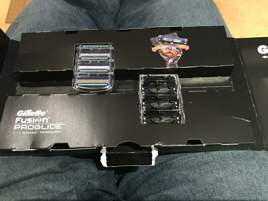 Unnecessary packaging for Gillette Fusion ProGlide razor, showcasing wasteful design.