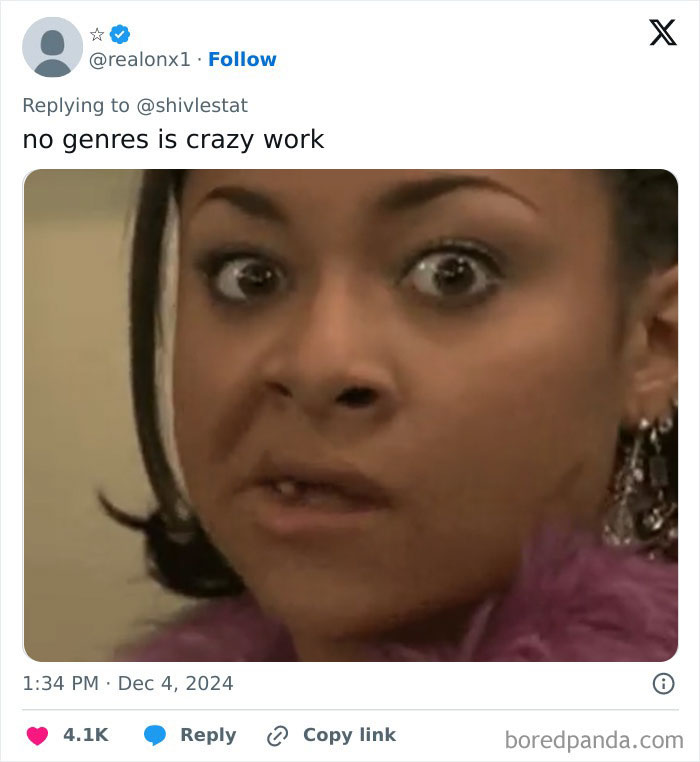 Close-up of a surprised person's face, reacting to Spotify Wrapped 2024 with text saying "no genres is crazy work."