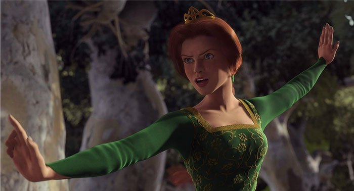 Animated character in a green dress striking a strong pose, embodying a strong female protagonist.