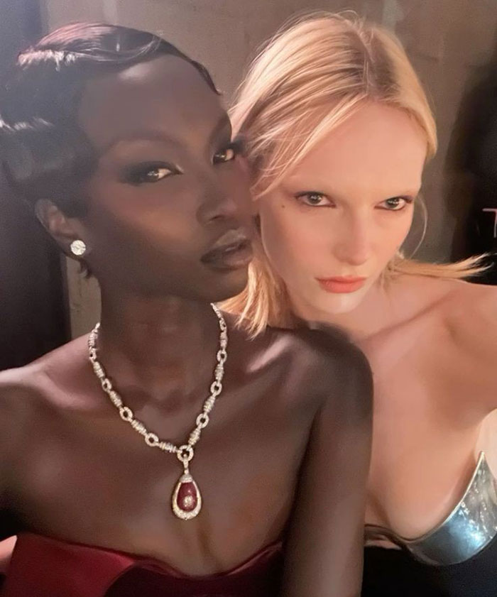 Anok Yai and white trans woman Alex Consani posing together. Anok Yai and white trans woman Alex Consani posing together.