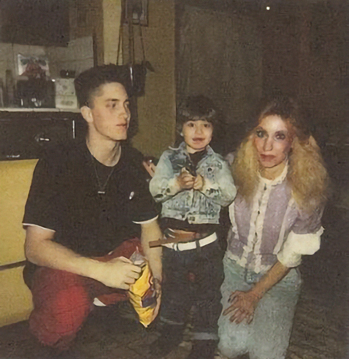Family photo with Eminem's half-brother Nate and their mother, showing a candid moment from the past.