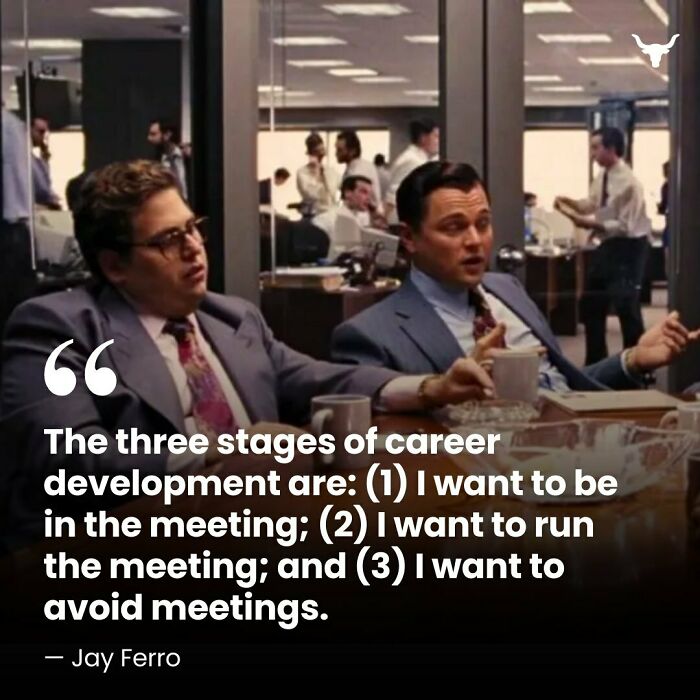 Two men in a business setting discussing career development stages, capturing a humorous moment related to investment memes.