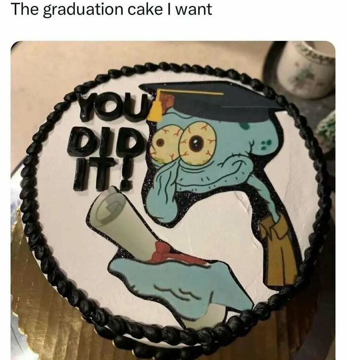 Graduation cake with a humorous design featuring a cartoon character celebrating with a diploma.