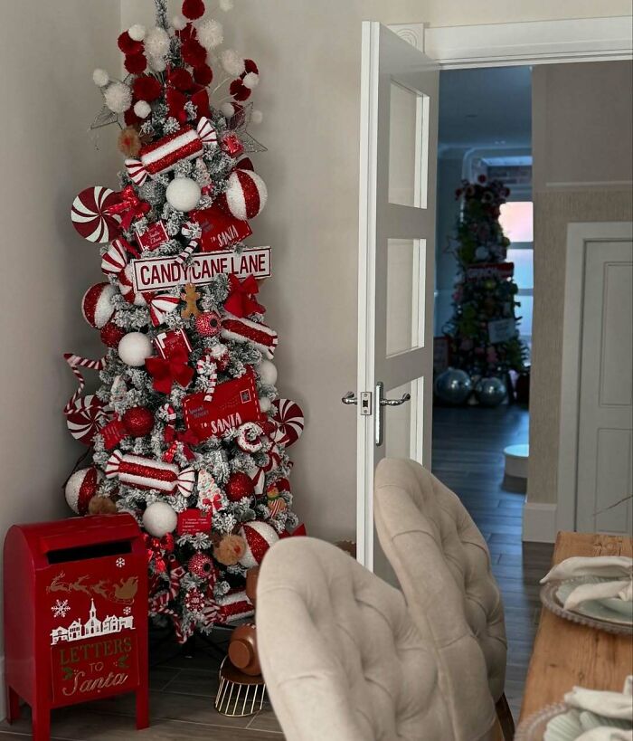 Christmas tree idea with candy cane decorations and red mailbox for Santa letters.