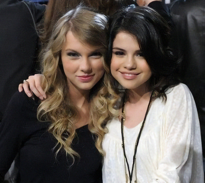 Selena Gomez and Taylor Swift posing together at an event.
