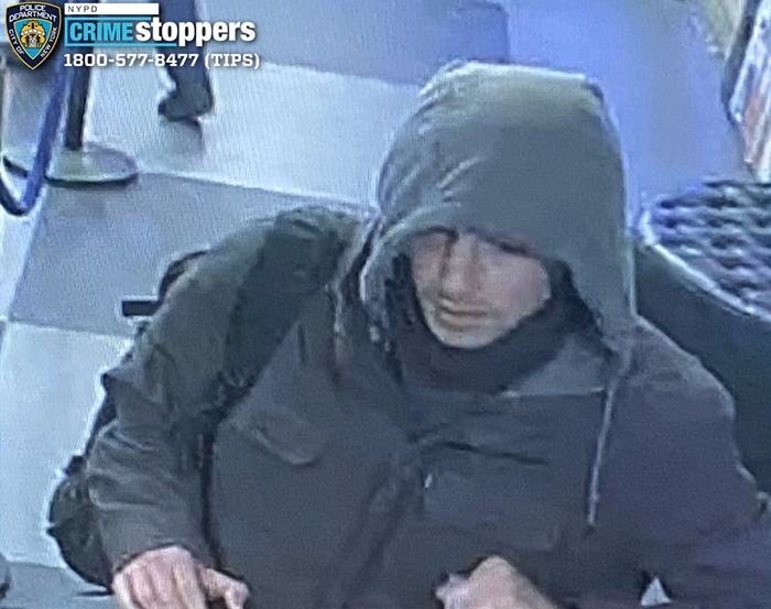 Surveillance image of hooded suspect linked to UnitedHealthcare CEO incident. Surveillance image of hooded suspect linked to UnitedHealthcare CEO incident.