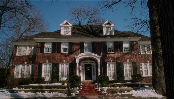A large brick mansion featured in Home Alone, spurring dad's wealth theories.