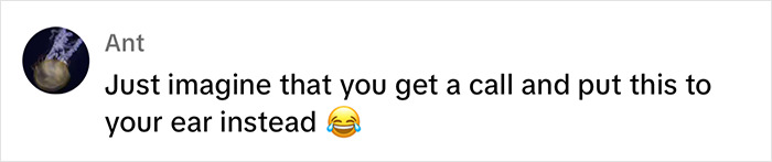 Text comment with a joke about using an item instead of a phone to deter snatchers, accompanied by a laughing emoji. Text comment with a joke about using an item instead of a phone to deter snatchers, accompanied by a laughing emoji.