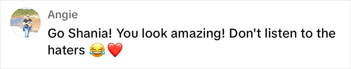 Comment showing support for Shania Twain's bold two-piece look with emojis.