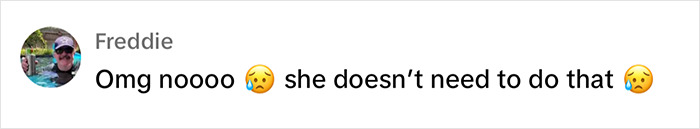 Comment expressing disapproval with crying emojis about Shania Twain's bold two-piece look on stage.