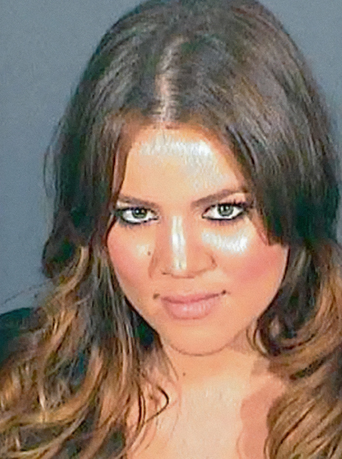 Khloe Kardashian with long, wavy hair and intense eye makeup in a viral criminal heartthrob mugshot.