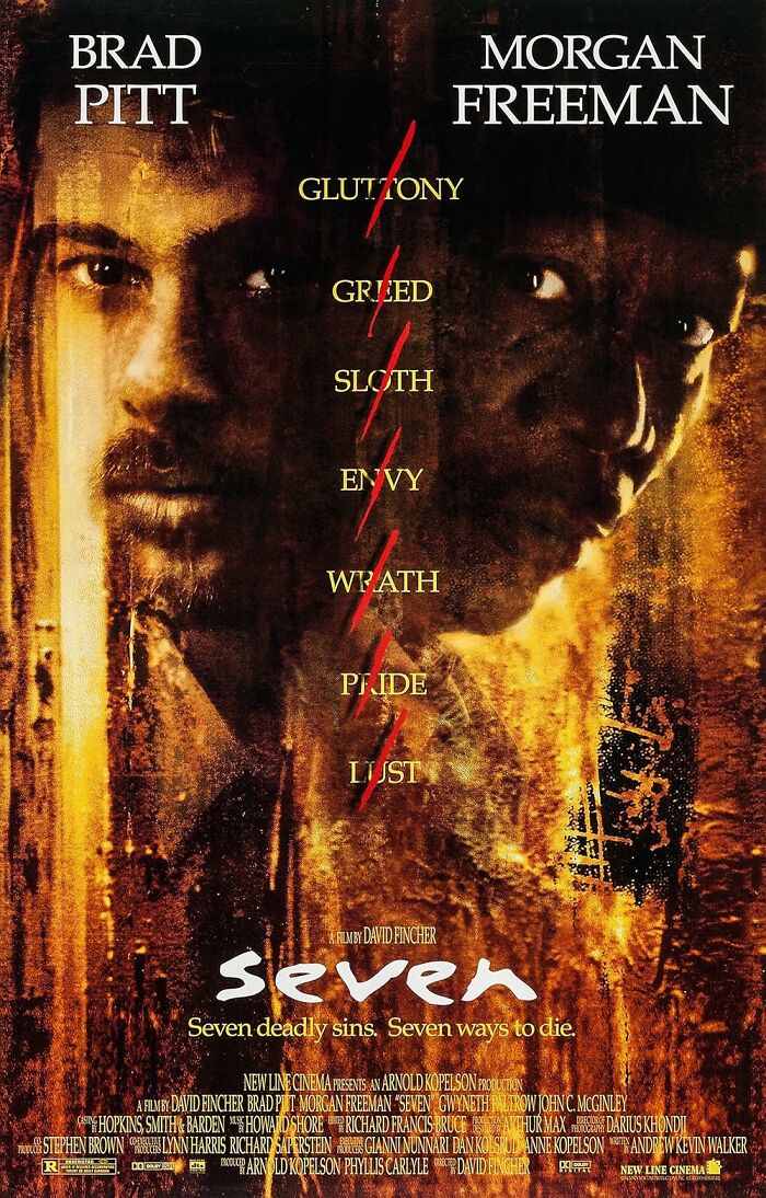 Poster of the movie "Seven," featuring Brad Pitt and Morgan Freeman, highlighting the theme of seven deadly sins.