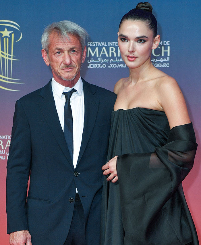 Sean Penn, 64, on the red carpet with his girlfriend, 30, in an elegant evening setting. Sean Penn, 64, on the red carpet with his girlfriend, 30, in an elegant evening setting.