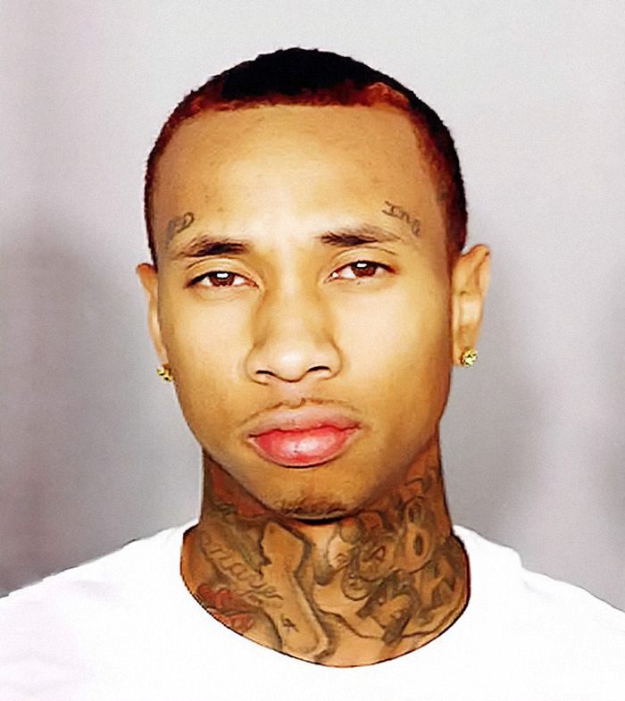 Rapper Tyga in a mugshot, representing viral criminal heartthrobs.