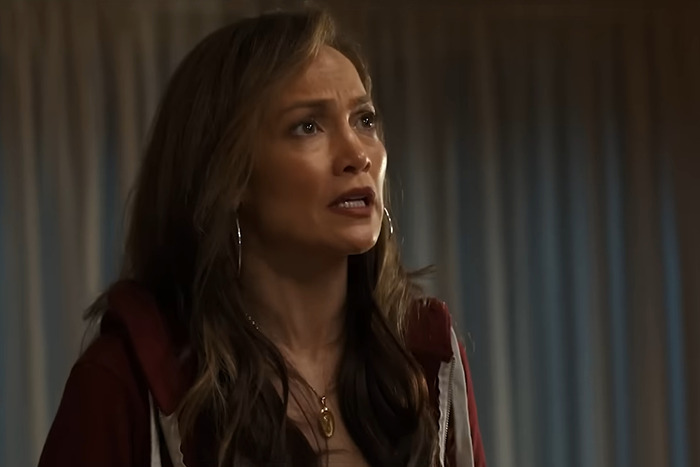 Jennifer Lopez in a scene from 'Unstoppable', wearing hoop earrings and a necklace, showcasing her bold style. Jennifer Lopez in a scene from 'Unstoppable', wearing hoop earrings and a necklace, showcasing her bold style.