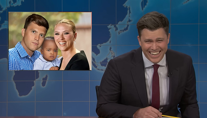 Colin Jost laughing during a segment, with an inset photo of a family, showcasing reactions to his jokes.
