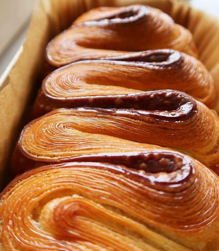 Close-up of beautiful, glossy pastry layers, a treat foodies absolutely love.