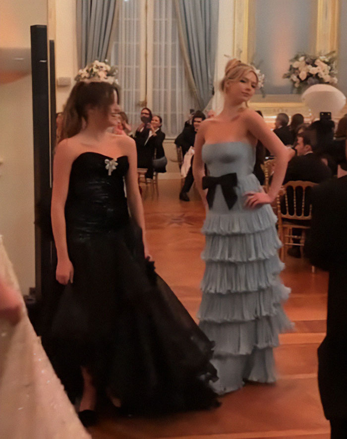 Apple Martin snub moment during French debutante ball in elegant gowns at a formal event, capturing the essence of a glamorous social gathering.