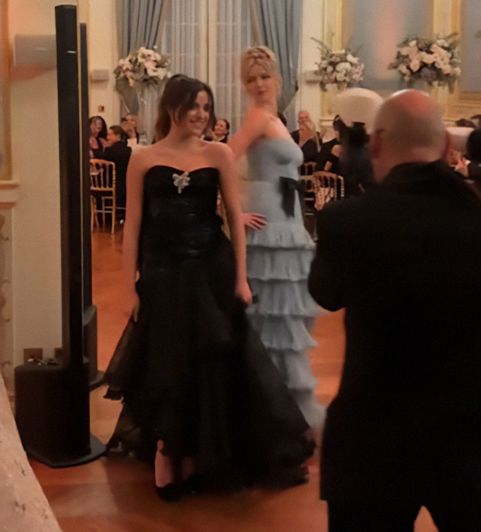 French countess Alieson Loppin de Montmort and Apple Martin in elegant dresses at a formal event, rude behaviour during French debutante ball, observed by a crowd, creating social media buzz about their behavior. French countess Alieson Loppin de Montmort and Apple Martin in elegant dresses at a formal event, rude behaviour during French debutante ball, observed by a crowd, creating social media buzz about their behavior.