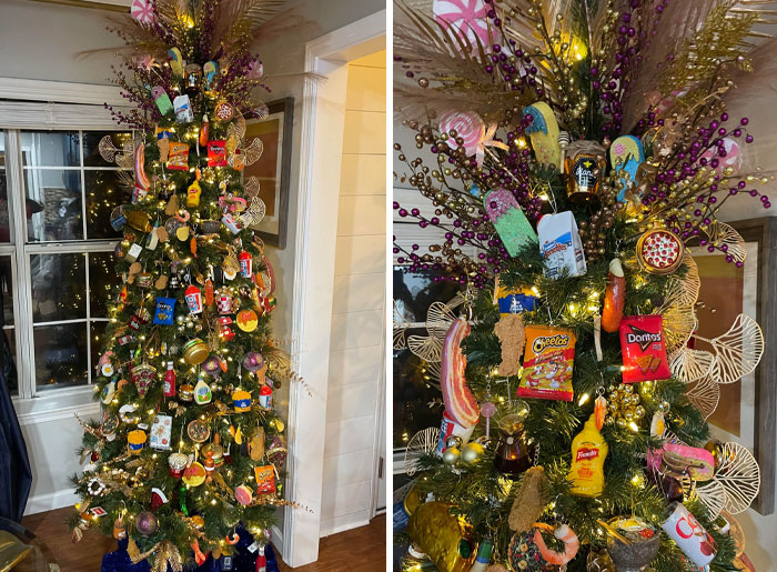Colorful Christmas tree decorated with snack-themed ornaments in a cozy living room setting.