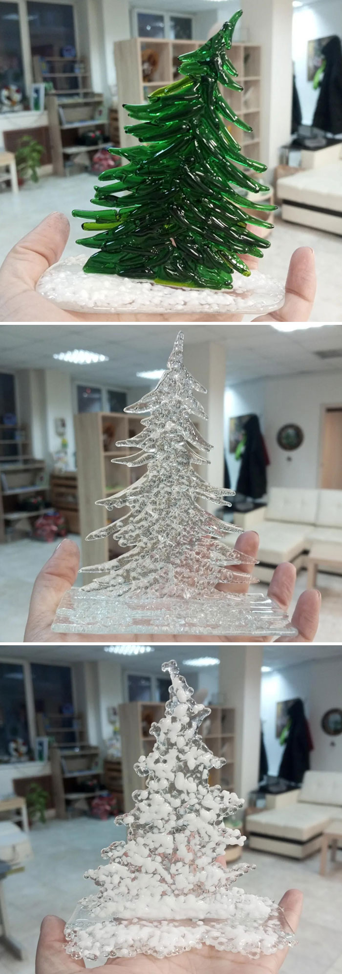 Hand holding creative DIY Christmas decorations made of glass in tree shapes.