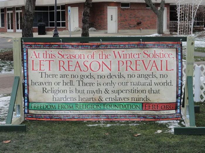 Billboard by atheist group advocating reason during Christmas, part of holiday message exchange with Christian groups. Billboard by atheist group advocating reason during Christmas, part of holiday message exchange with Christian groups.