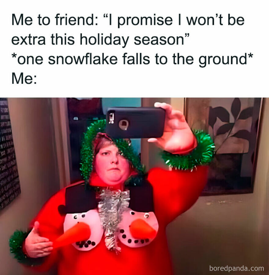 Person wearing a funny Christmas costume with snowmen, taking a selfie in a mirror. Perfect for hilarious Christmas memes.