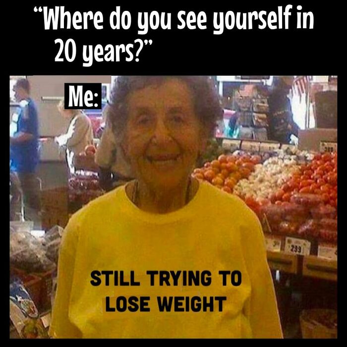 Elderly woman wearing a yellow shirt with text about dieting and weight loss humor, standing in a grocery store.
