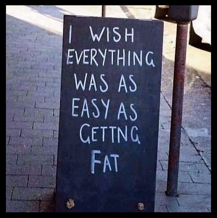 Sign with humorous dieting meme about how easy it is to gain weight.