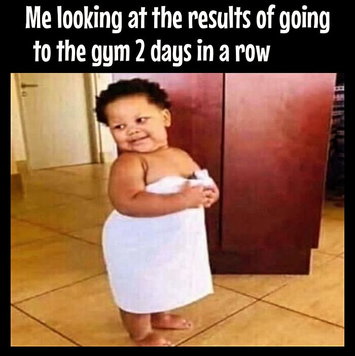 Child wrapped in a towel playfully smirking, illustrating the humor in dieting frustrations.
